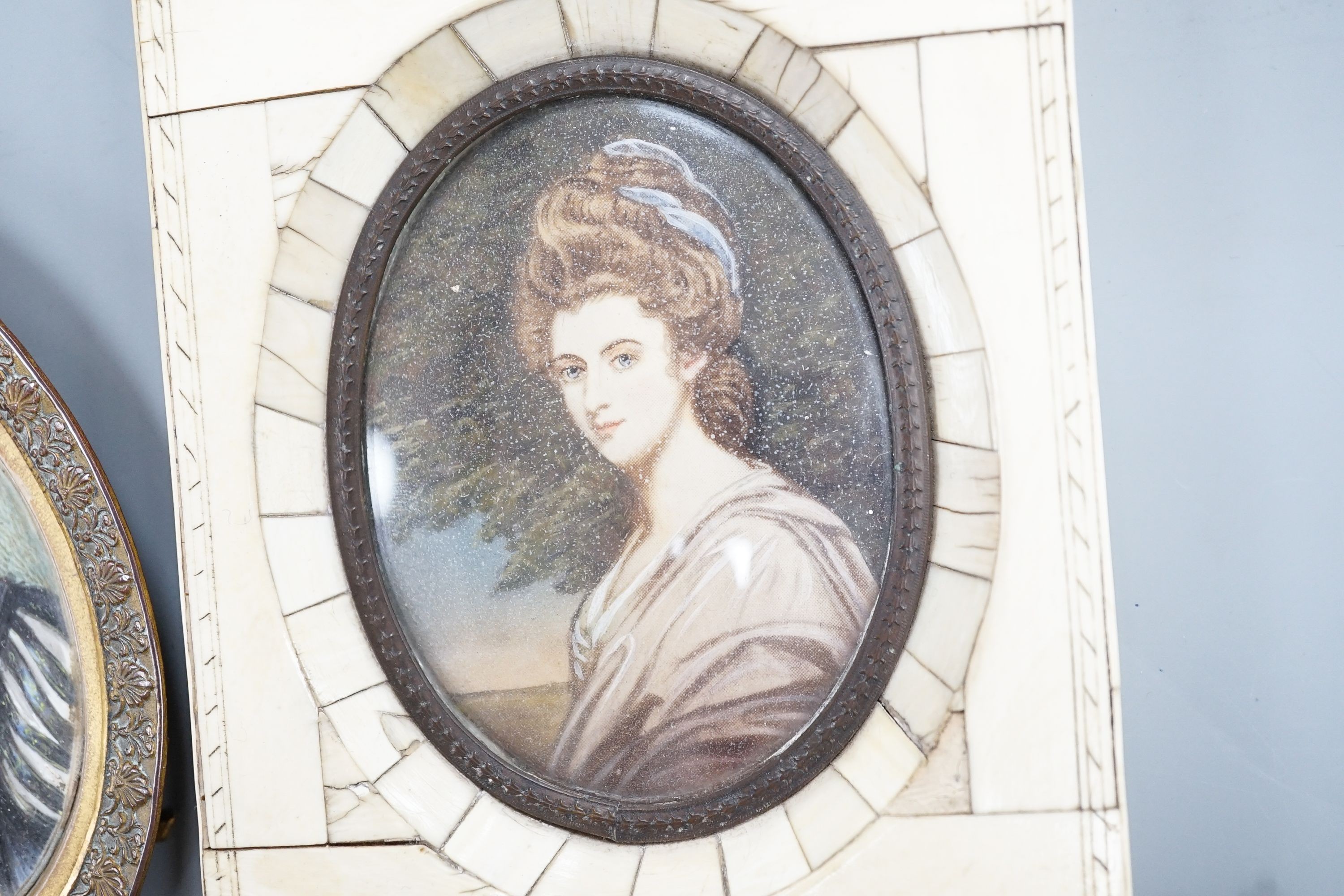 A paste and enamel framed Portrait miniature on ivory, 9.2cm and four other portrait miniatures (three on ivory)